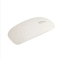 Portable nail dryer in white colour with phototherapy lamp and sealing function on a table