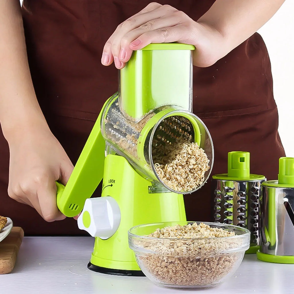 Mandoline vegetable slicer with three stainless steel blades and suction base in blue green, green, or red
