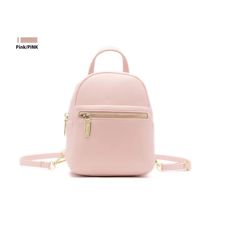 Soft PU mini backpack in street style, shown open to reveal internal phone pocket and zipper bag.