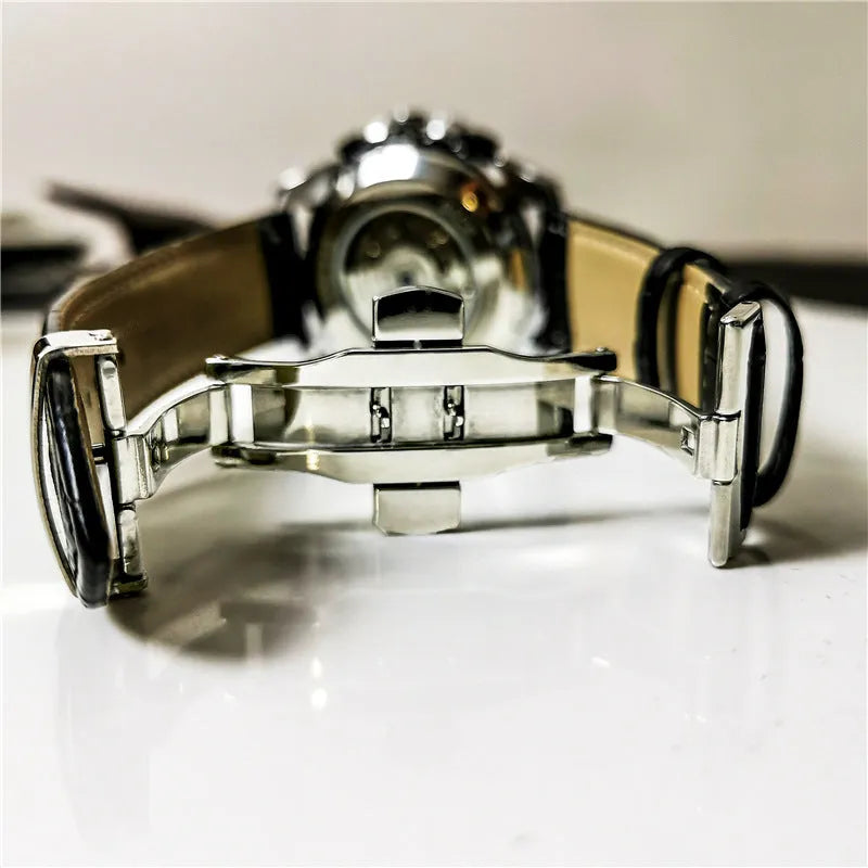 Men's automatic mechanical watch with a 12mm thick case shown in various colour combinations including silver and black.
