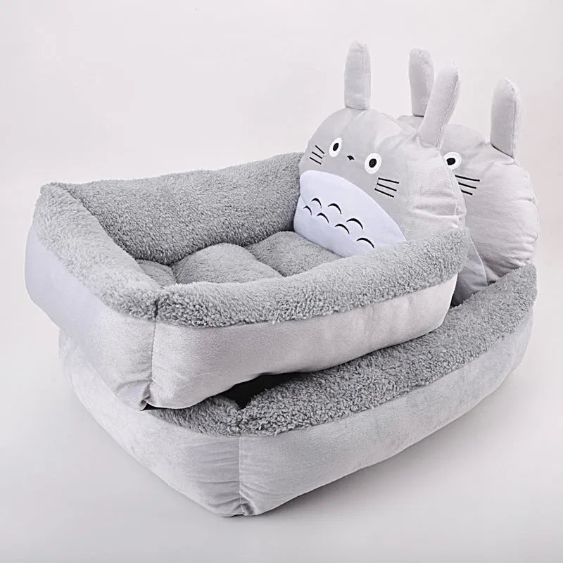 Cartoon-style sofa bed for small dogs or cats, shown in a choice of colours with soft plush interior.
