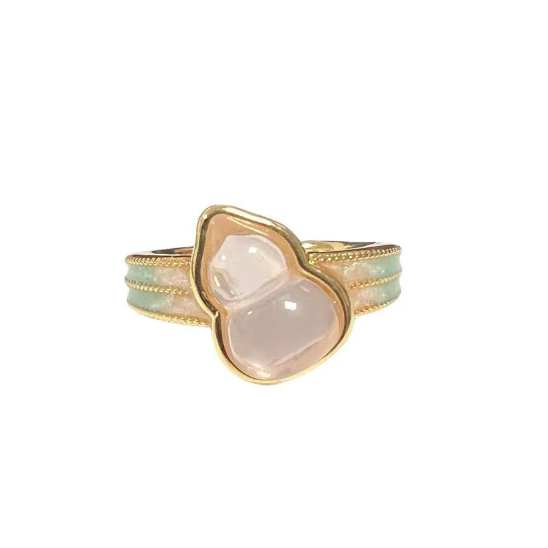 Close-up of an adjustable copper ring with a gourd shape and inlaid zircon decoration in New Chinese style.