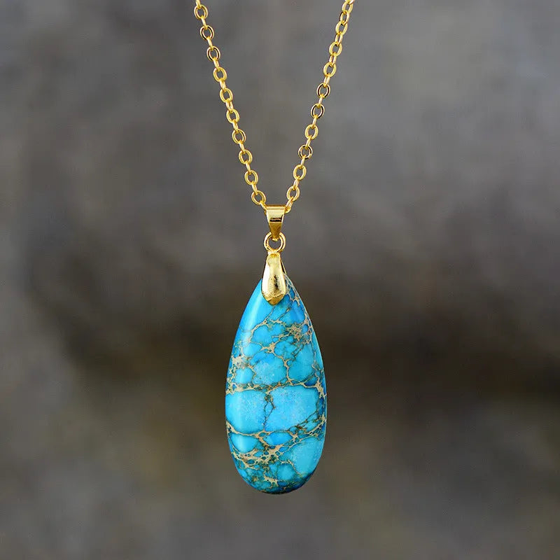 Emperor Stone water drop shaped jade pendant necklace with 18K gold plating on a chain.