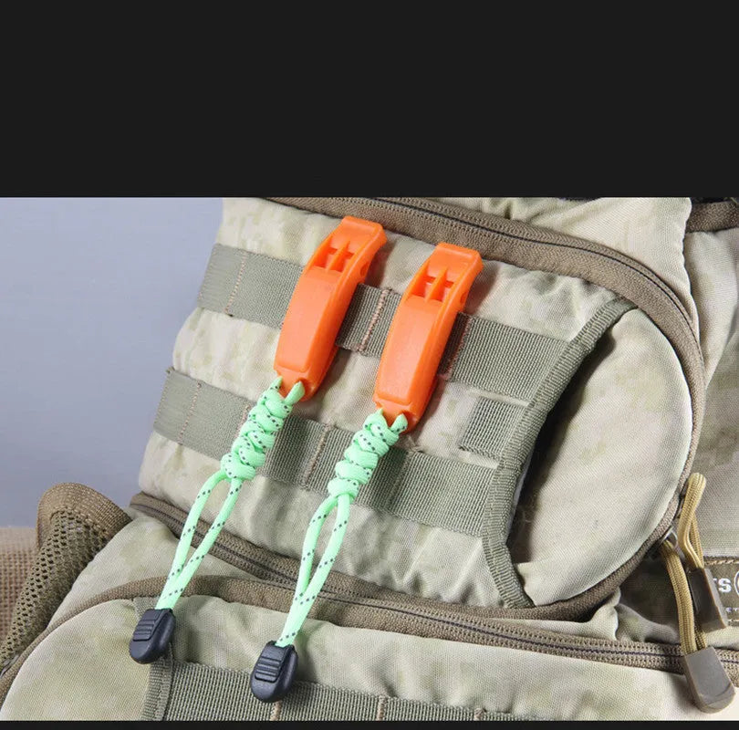 Fire survival whistle in black or orange, high impact plastic, 7.2cm x 2cm, with 10cm or 50cm lanyard