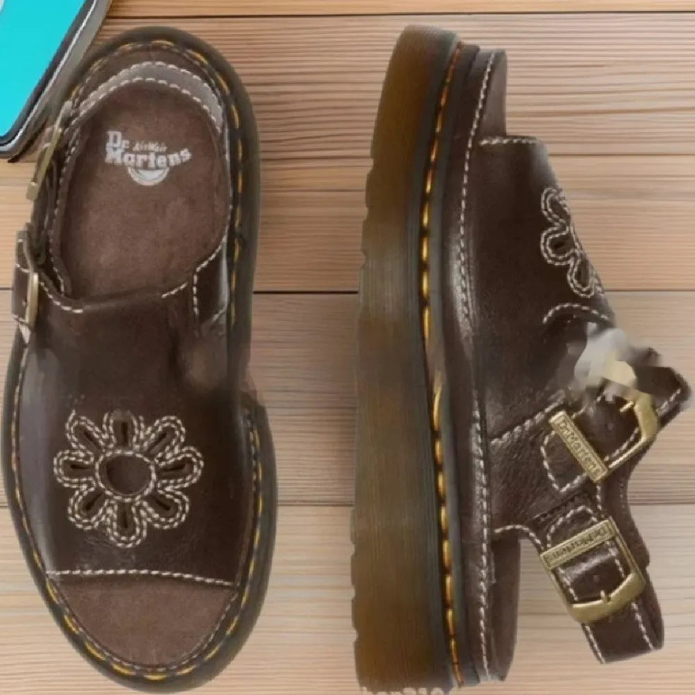 Men's black embroidered floral beach sandals with a flat heel and PU leather upper.
