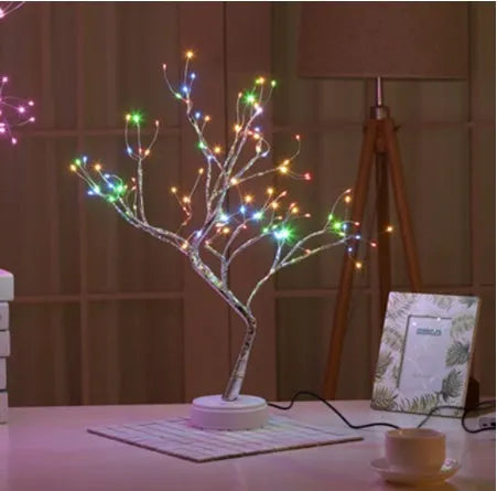 50cm tall touch-controlled LED Christmas tree light with 108 multi-colour lights on plastic and copper wire branches
