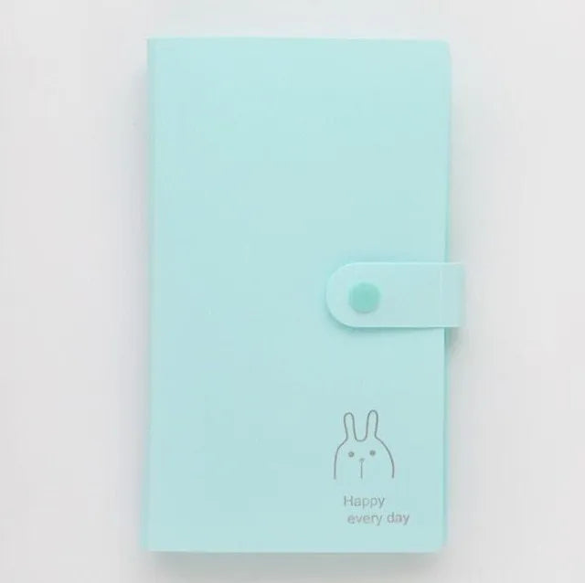 Blue PVC and PP business card holder book showing protective shell and insert pockets for cards.