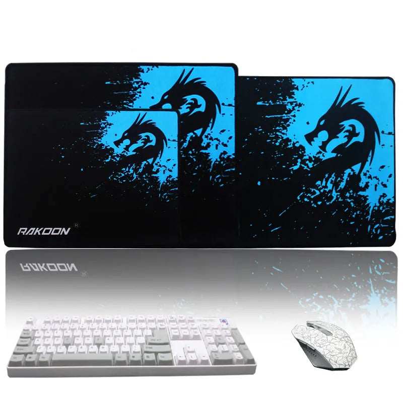 Mouse pad with textured surface and reinforced stitching edges on a desk
