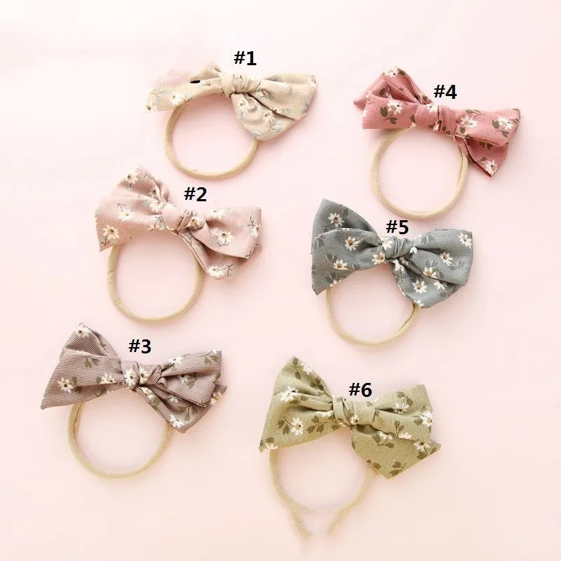 Children's cloth knotted bow hair ring in a Snow White princess design.