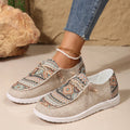 Women's flat round-toe low-top shoes in black, dark grey, or khaki with a rubber sole.
