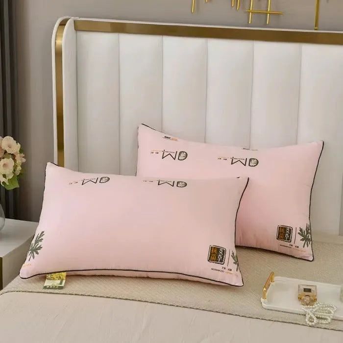 A white chemical fibre bedding pillow with a polyester shell, shown next to a blue argy wormwood patterned variant.