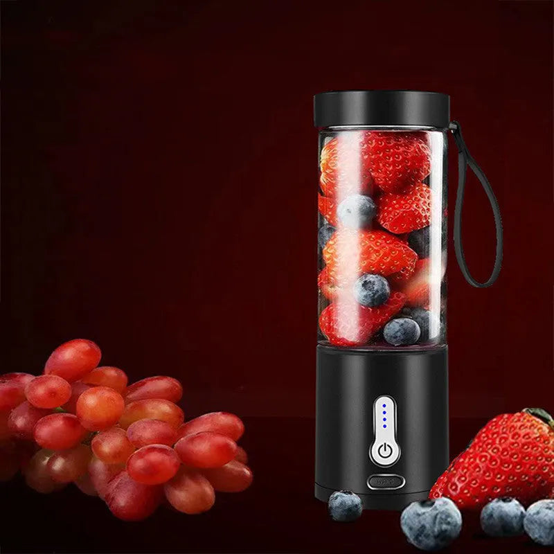 Portable hand-operated rechargeable blender with juice cup in black, white, blue, and rose red colours