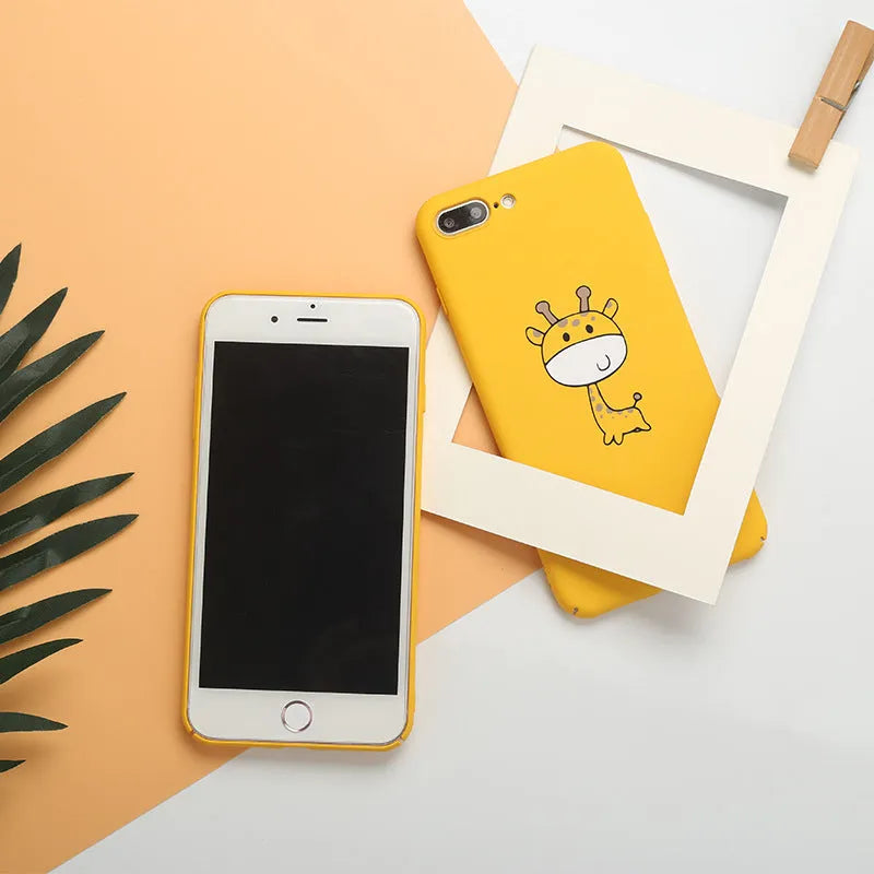 Yellow patterned polycarbonate phone case for iPhone models on a white background.