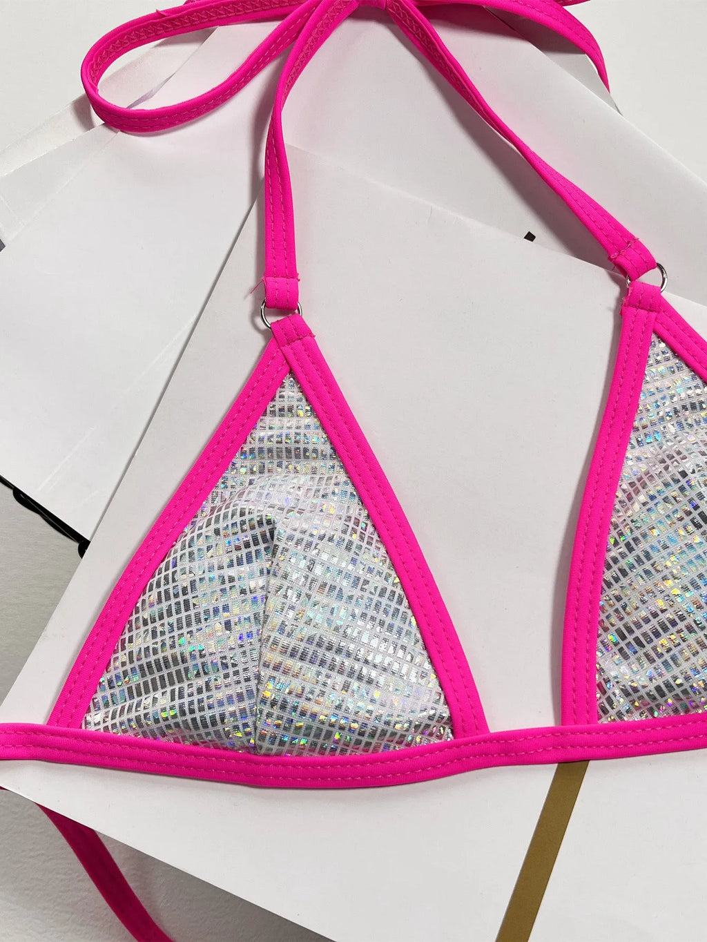 Silver women's split triangle bag bikini top on a white background.