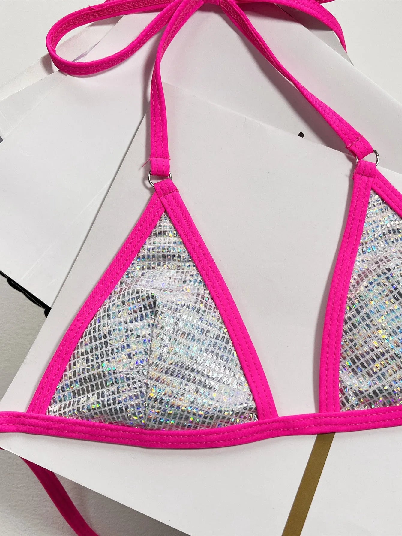 Silver women's split triangle bag bikini top on a white background.