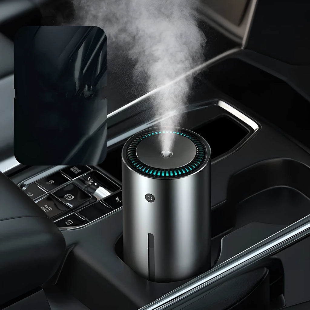 Black aluminium alloy car humidifier and air purifier with USB cable, shown in a vehicle cup holder.