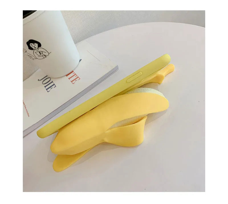 Yellow banana-shaped silicone phone case with unzip feature for iPhone protection