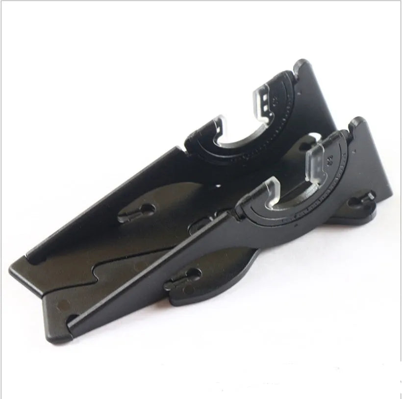 A plastic card type mobile phone holder for desktop use, shown in various colours.