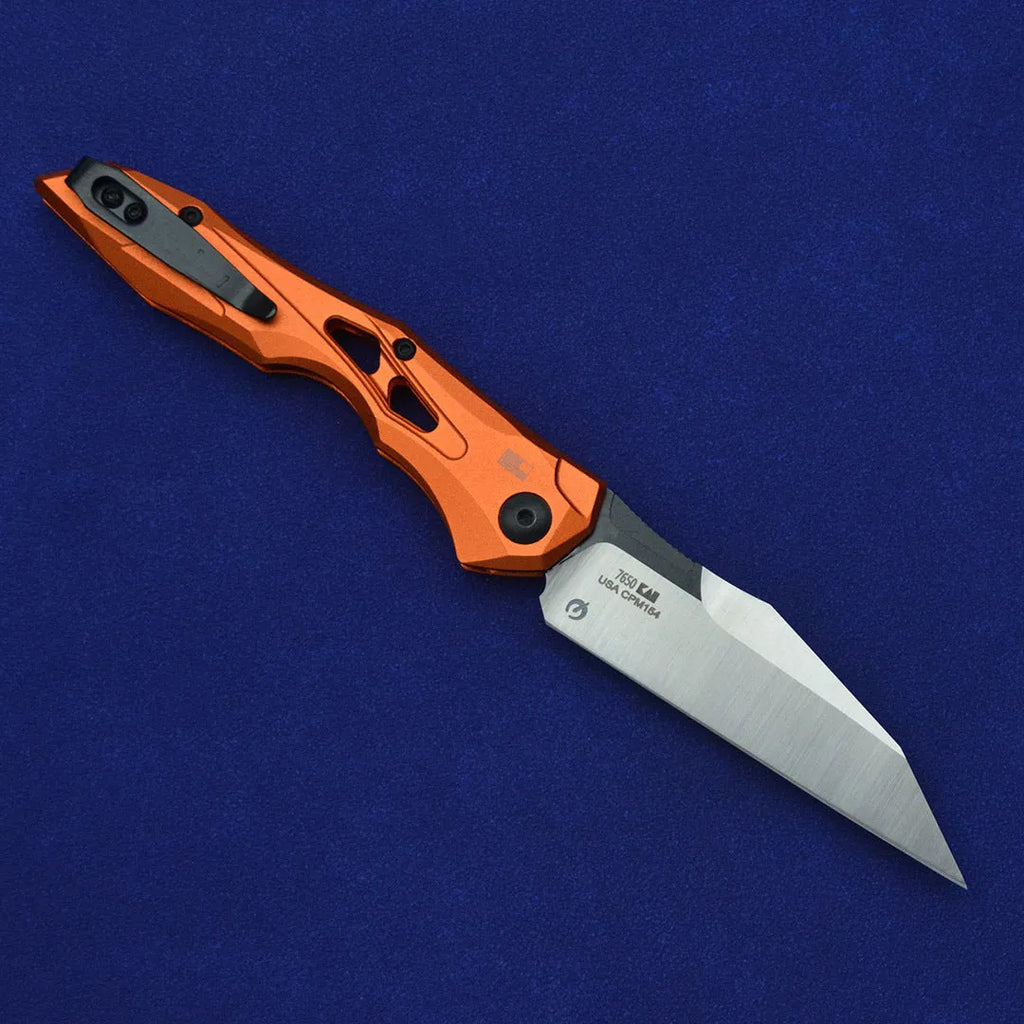 Black folding fruit knife with D2 steel blade and aluminium handle showing open and closed positions