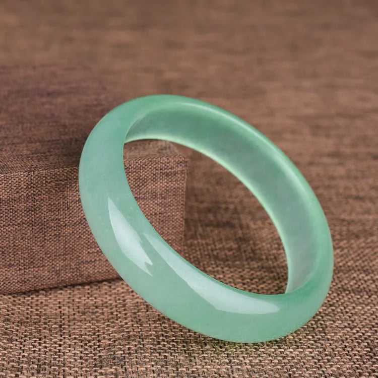Women's jade bracelet in blue or green colour with adjustable sizing