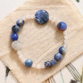 Hand-woven natural blue point stone and black hair crystal agate bracelet with geometric design