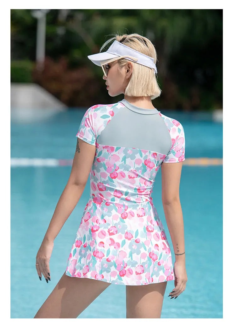 Colour printed plus size one-piece swimsuit on a hanger