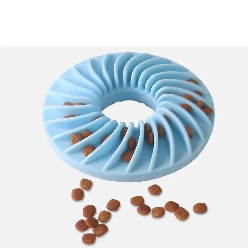 Soft round TPR leakage food pet toy for puppy slow feeding and teething in blue, green, and pink
