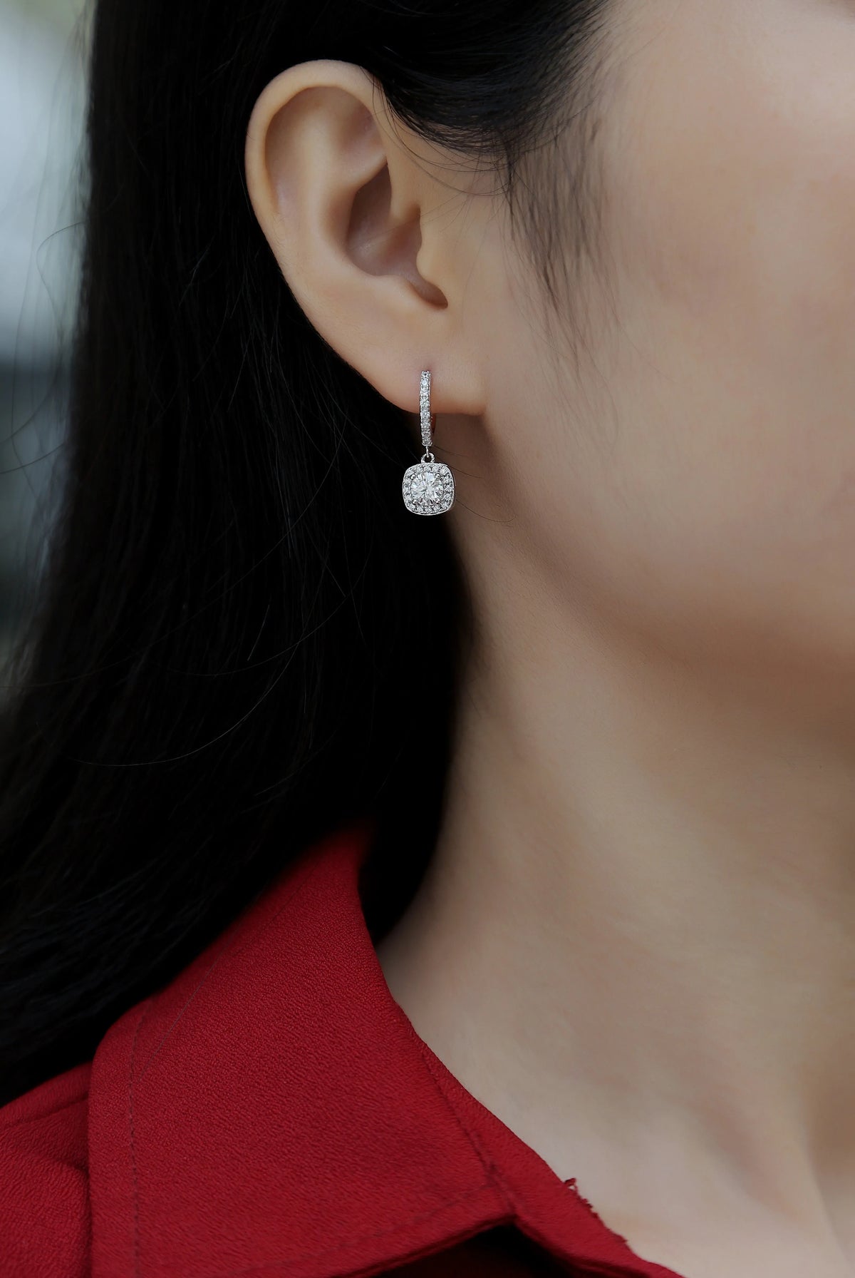 Pair of 0.5-carat total moissanite stud earrings in S925 silver with platinum plating, shown with gift box and GRA certificate