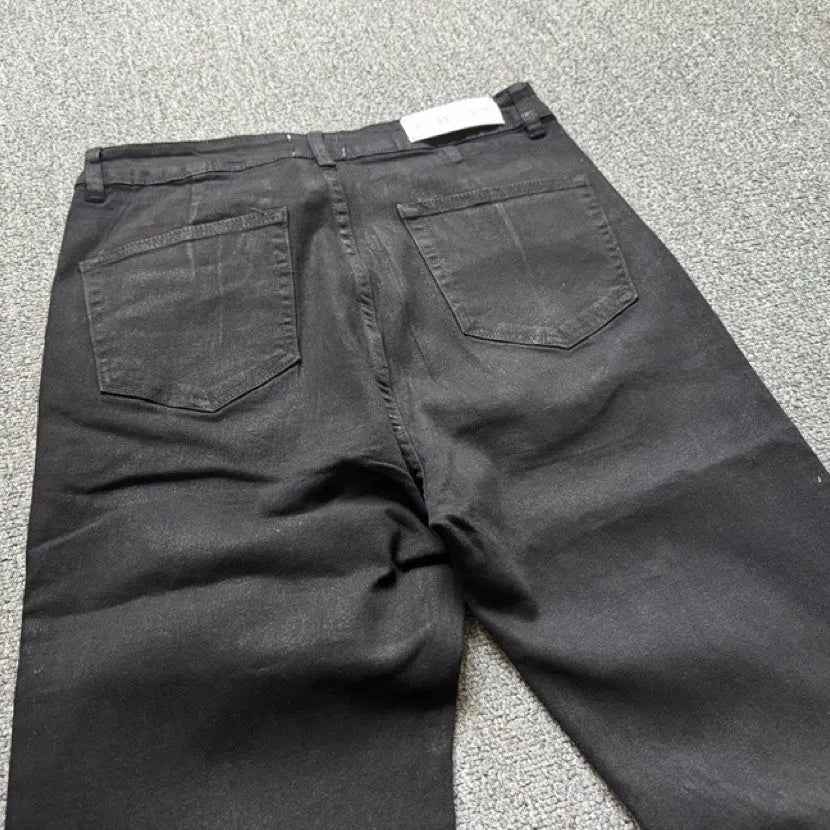 Retro black wax coating washed loose fit men's jeans with mid waist and zip fly