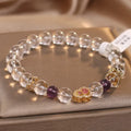 Natural white crystal bracelet for women with transparent gourd detail on light background