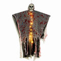 Halloween hanging ghost ornament with a blood-dyed luminous skull, made from plastic.