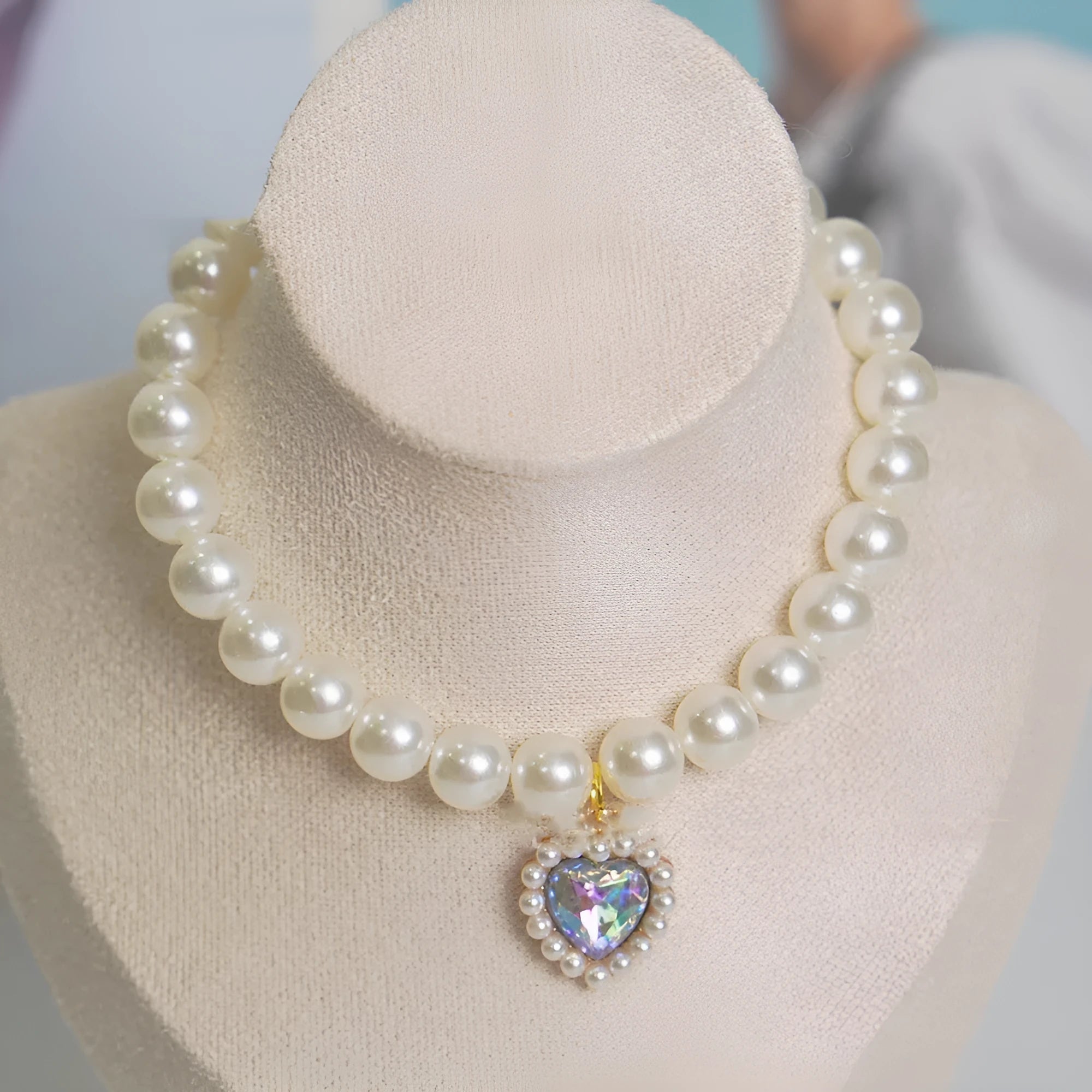 Decorative cat collar necklace with love gem design in translucent colours