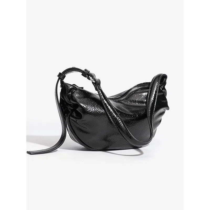 Black pleated shoulder bag in soft PU with rock-and-roll style and three-dimensional outer pocket