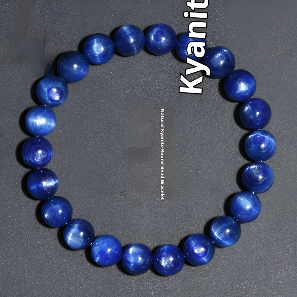 A polished blue crystal bracelet with geometry-shaped beads and a Ruyi charm on a single circle.