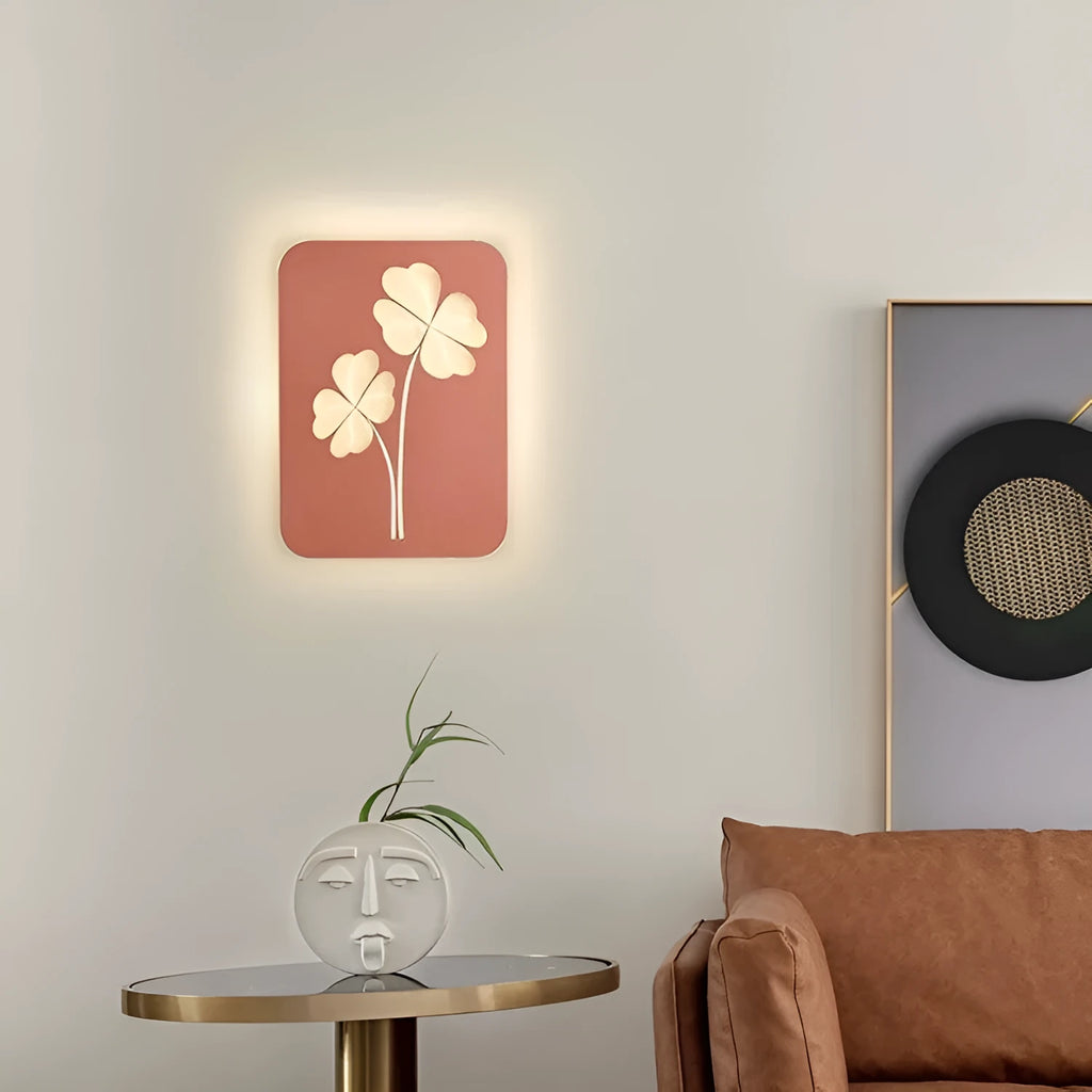 Modern wall lamp with acrylic decorative shade showing tricolour LED lighting and iron construction