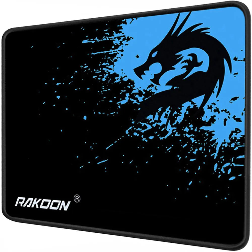 Mouse pad with textured surface and reinforced stitching edges on a desk