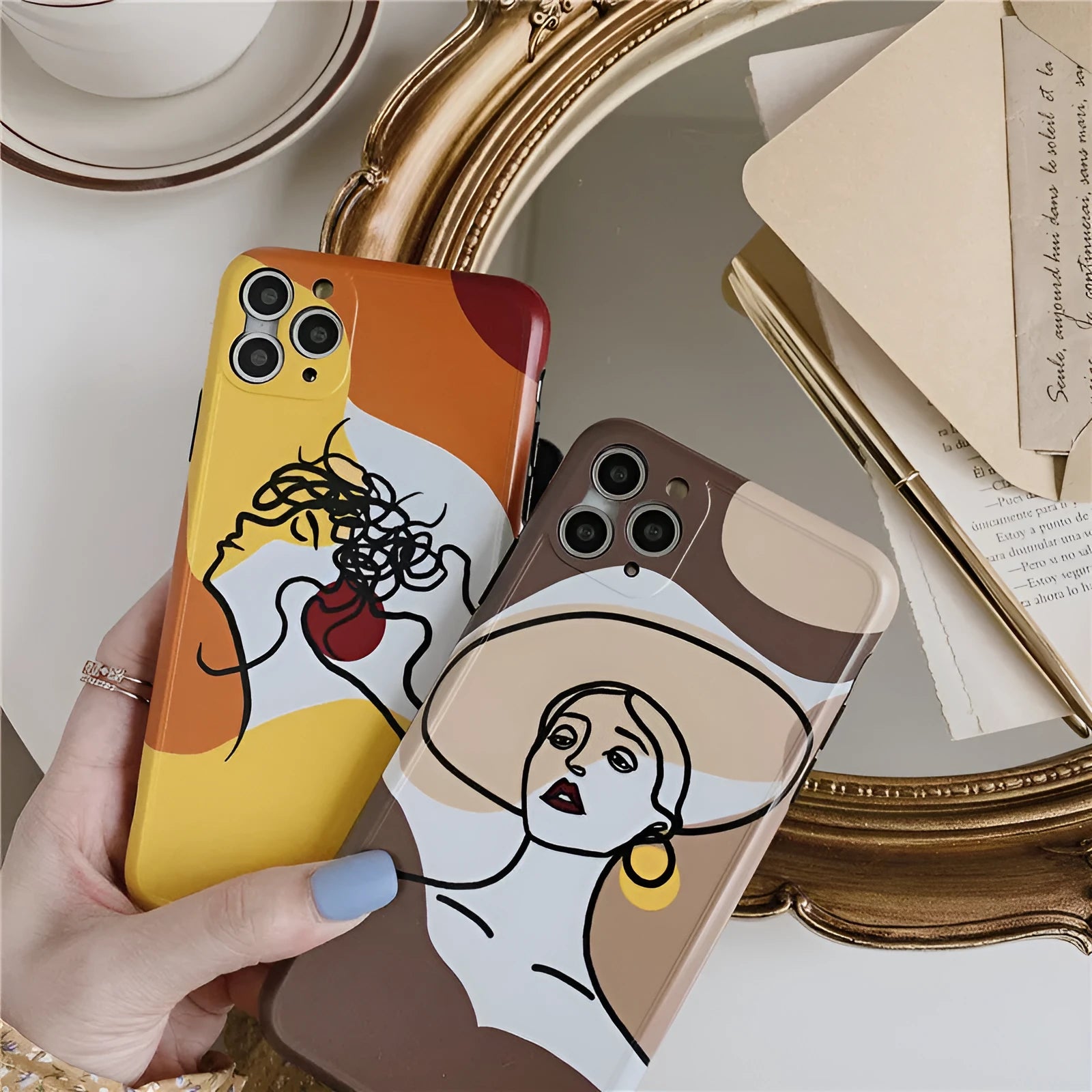 Orange yellow soft gel iPhone case with hand-drawn line art cartoon design.