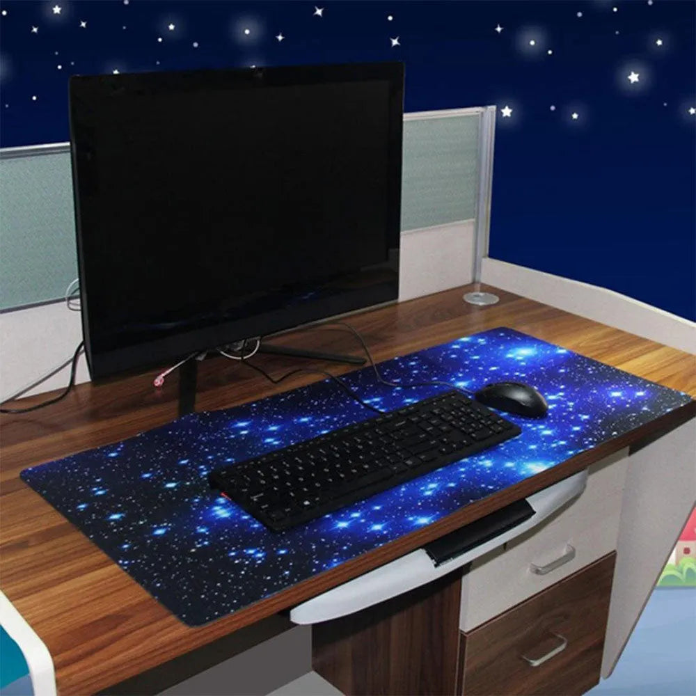 Blue star mouse pad with high-density fabric surface and anti-skid natural rubber base on a desk