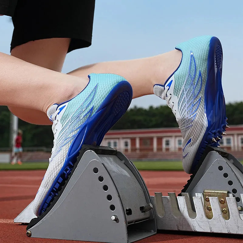 Track and field spiked shoes with mesh upper, PVC sole, front tie-up fastening, white and blue, sizes 36-45
