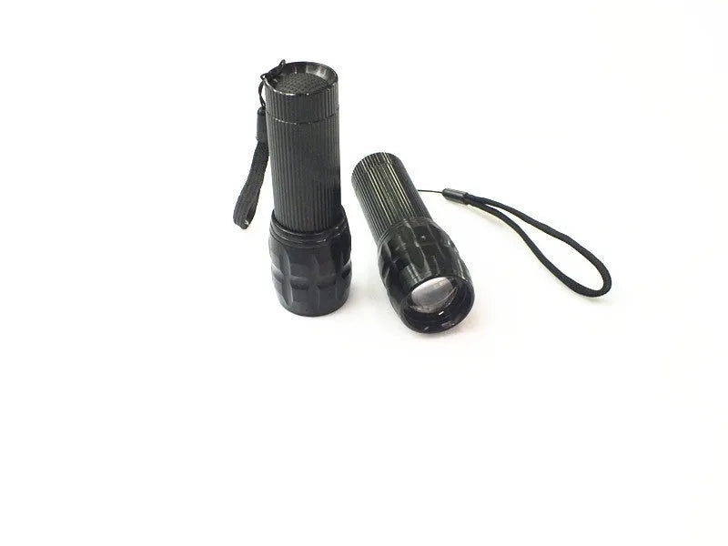 Black mini LED flashlight with telescopic head and tail push button switch, head diameter 3.1 cm