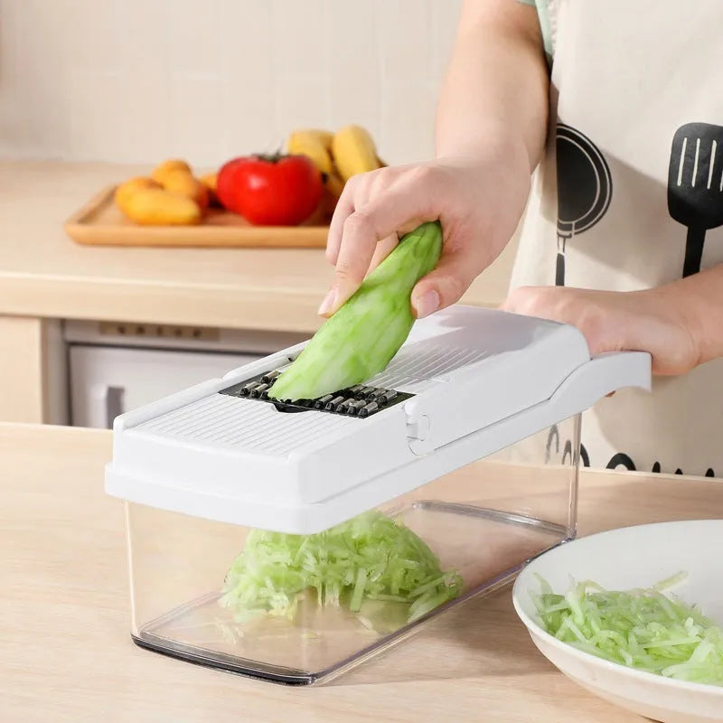 Multipurpose plastic vegetable cutter with 7 blades, drain basket and cleaning brush in black