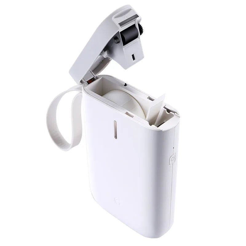 Handheld Bluetooth thermal label printer with label roll inserted, compact 130x75x28mm size
