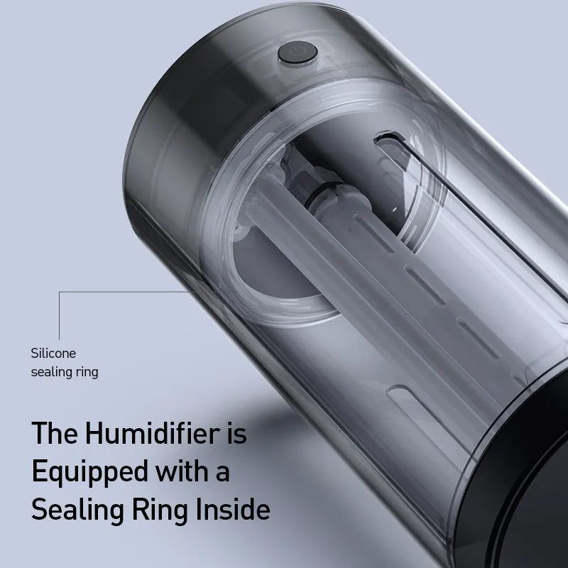 Black aluminium alloy car humidifier and air purifier with USB cable, shown in a vehicle cup holder.