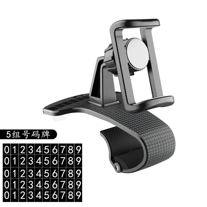 Black 360-degree adjustable universal car phone holder on a dashboard