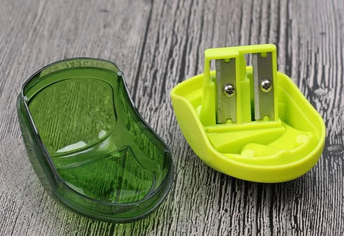 Double hole pencil sharpener with solid closed hole design for standard and thick pencils