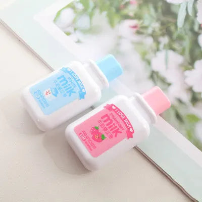 Creative bottle-shaped correction tape dispenser with cute pattern, showing 6-metre length.