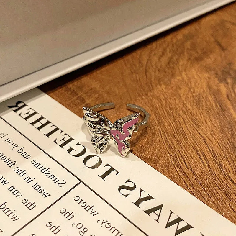 Copper women's ring with Chinese butterfly design and oil-drip finish in simple jewellery style