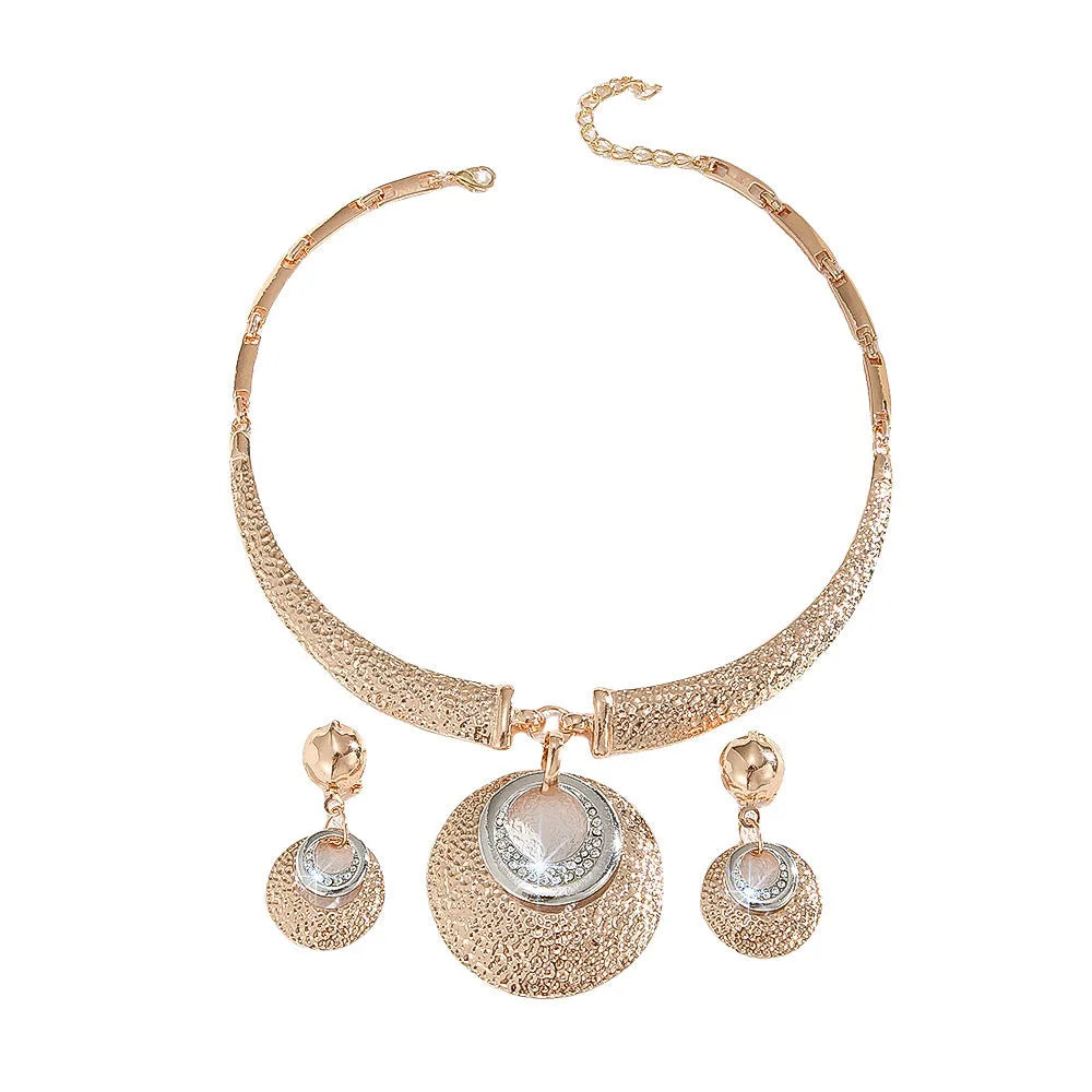 Gold alloy circle necklace and earrings set for women with celestial pattern options