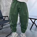 Man wearing loose-fit, cropped-length casual sports trousers in bamboo fibre fabric.
