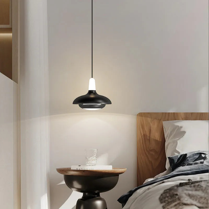 Adjustable Nordic style bedside pendant light in obsidian black finish with three colour temperature settings